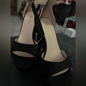 Black open toe, strap around ankle, platform pumps